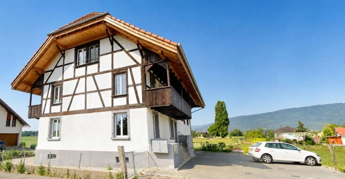 Charming Apartment in Gampelen - Photo 1 of 11