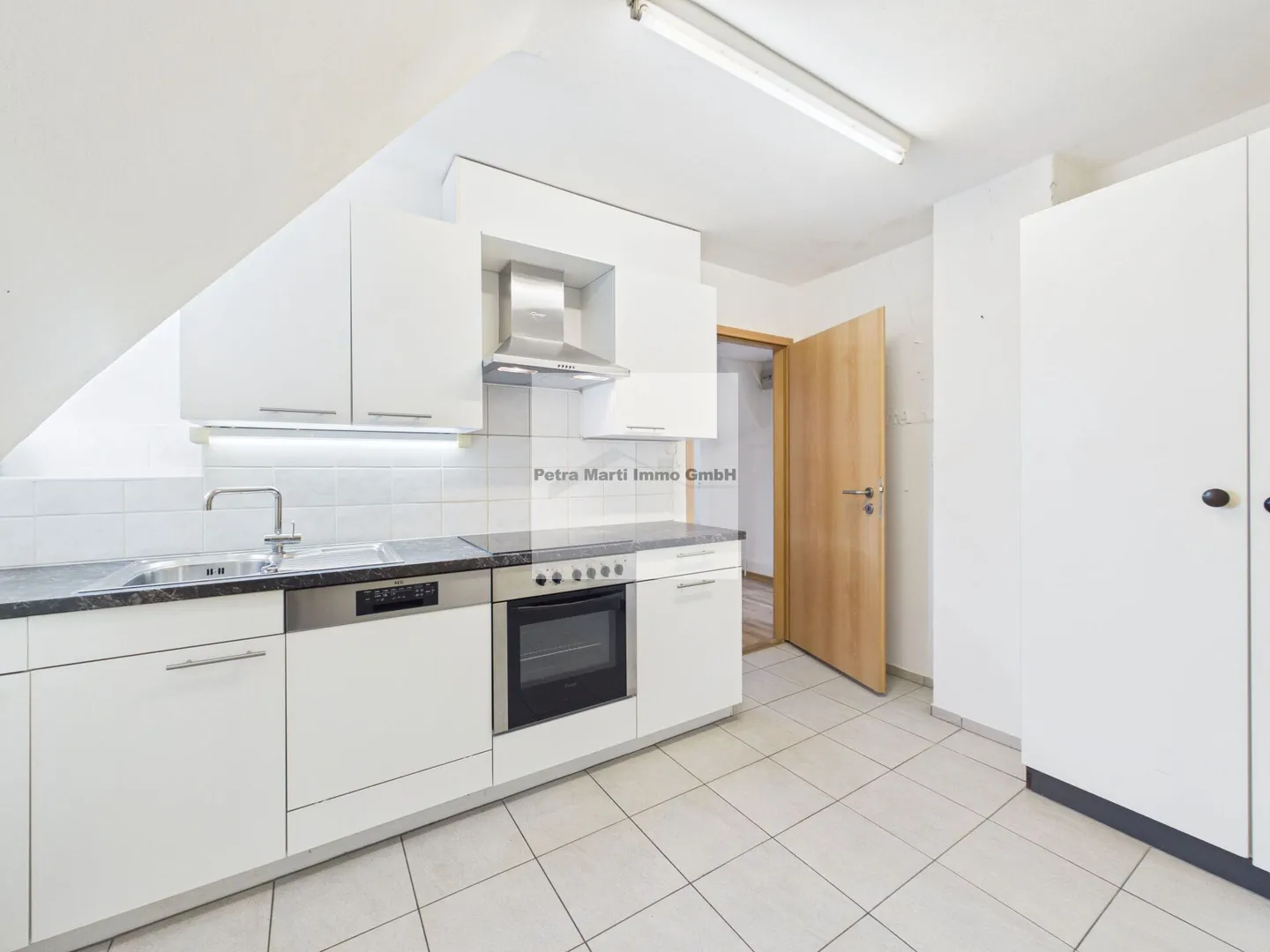 Accogliente appartamento mansardato di 3.5 locali in posizione tranquilla - Foto 1 di 11