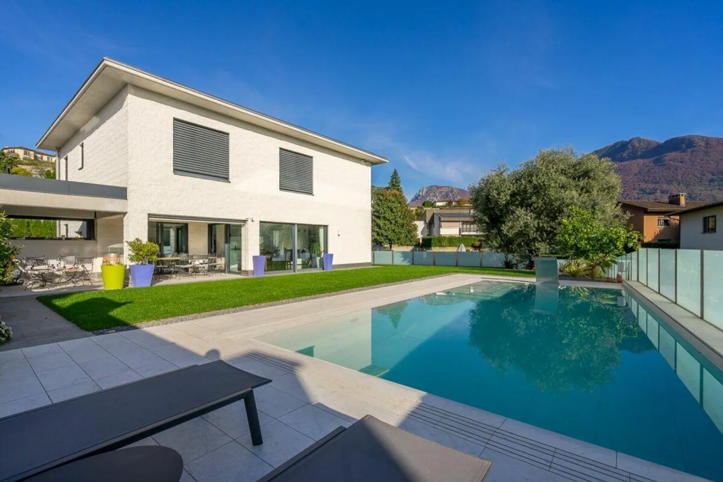 COMANO · MODERN VILLA WITH POOL AND ADVANCED HOME AUTOMATION - Photo 1 of 13