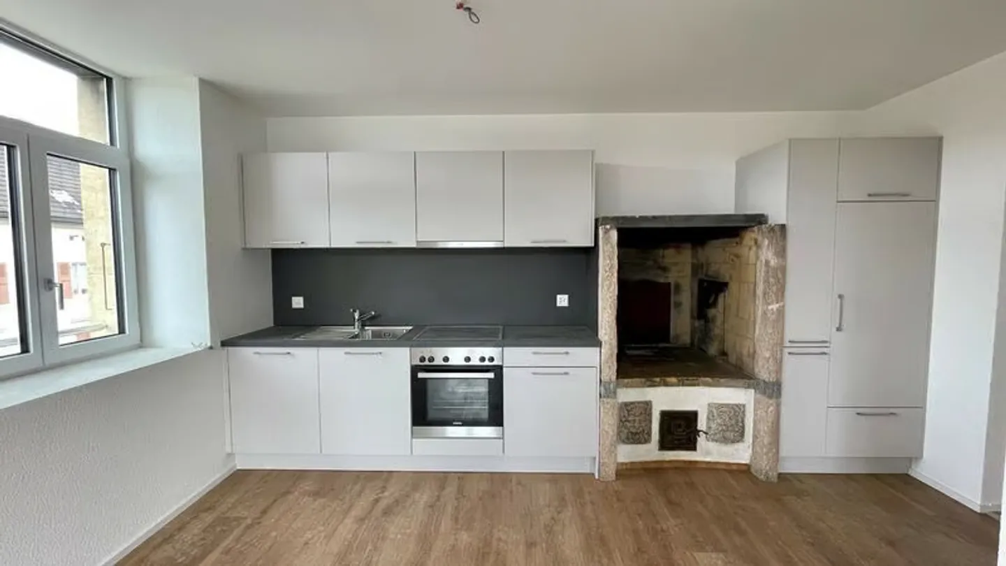Appartement de deux pièces et demie - Photo 2 sur 11