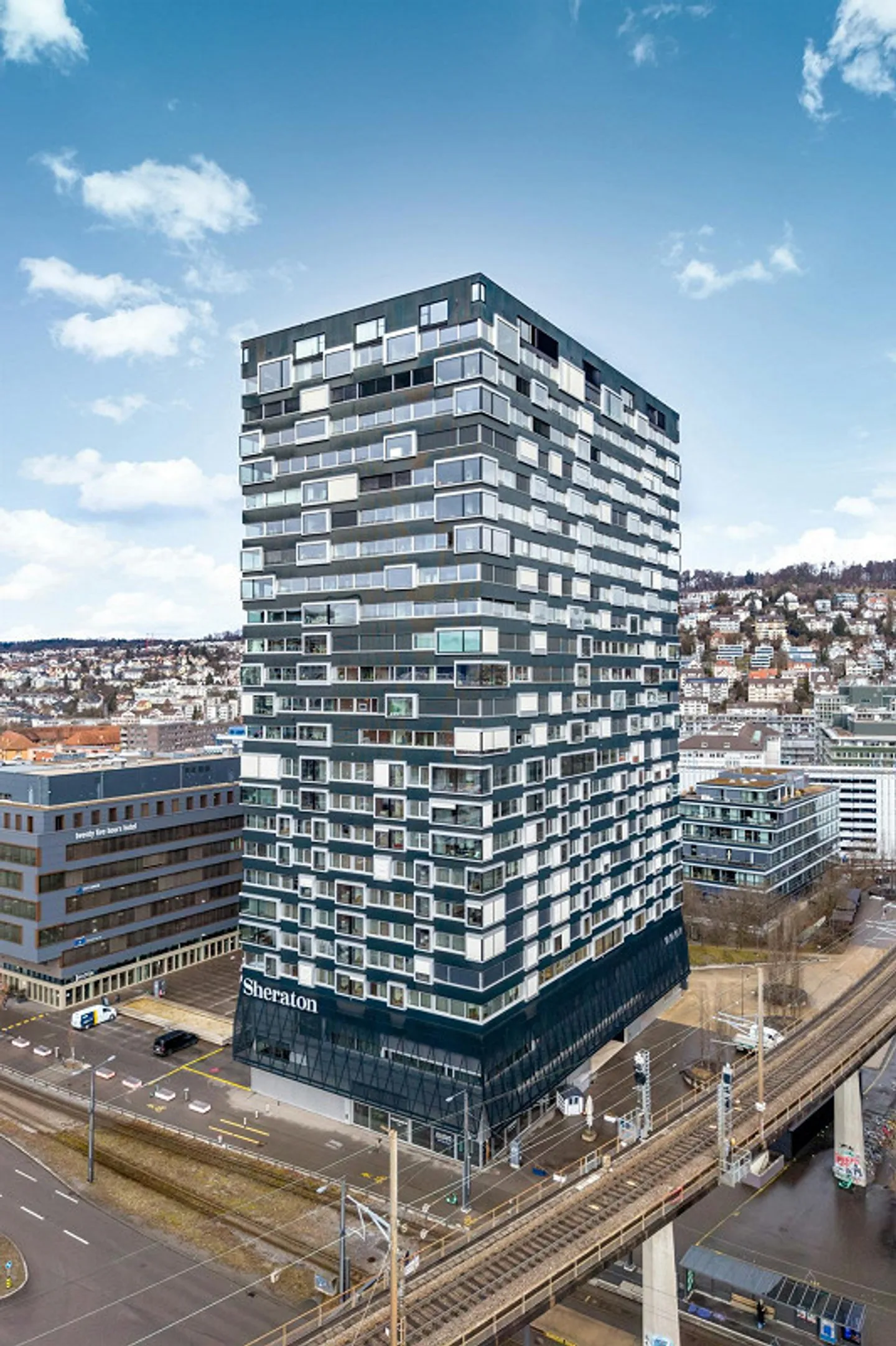 Skyline Living above Zurich - Living on the 18th Floor - Photo 12 of 13
