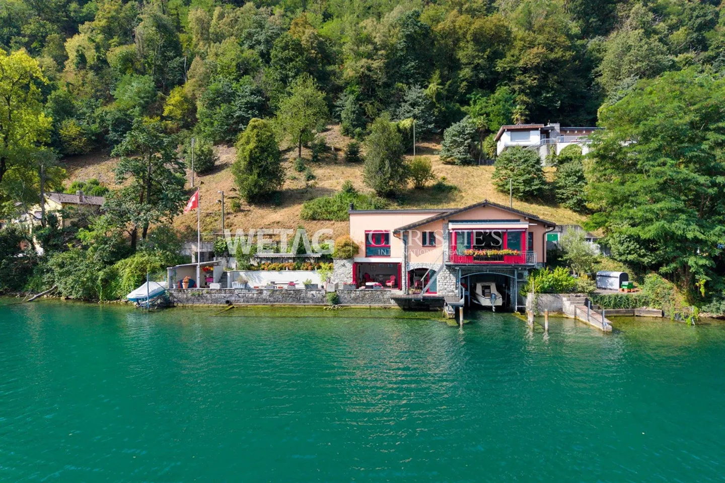 Directement au bord du lac avec place de bateau : Charmante villa à Riva San Vitale à vendre - Résidence secondaire possible - Photo 1 sur 13