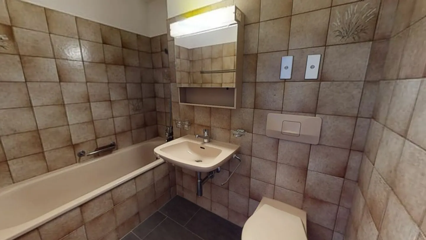 Charmante 2.5-Zimmer-Wohnung - Foto 2 von 11