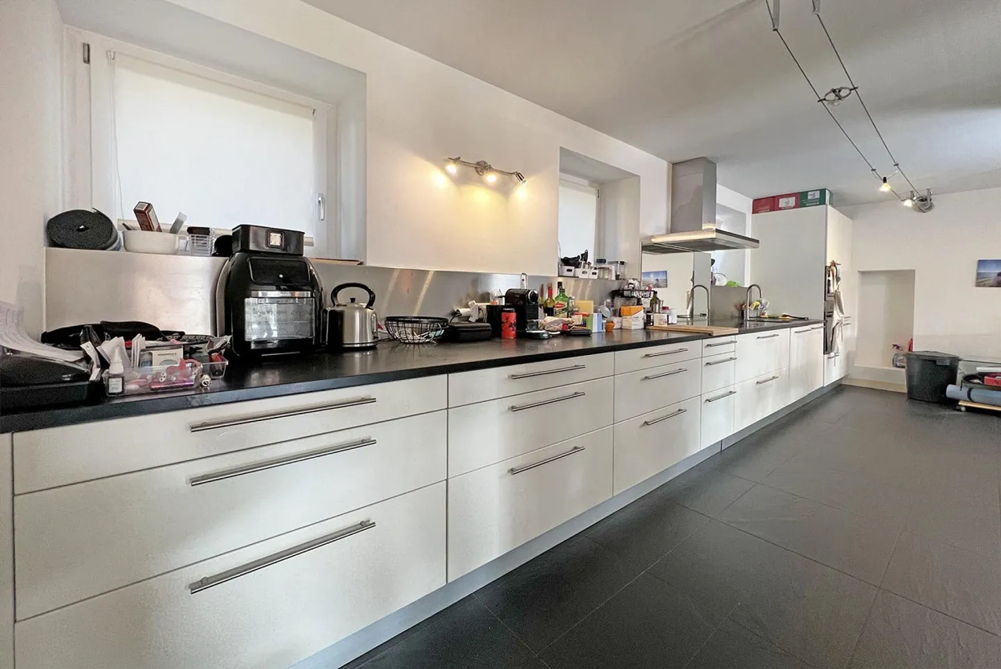 SPACIOUS DUPLEX 3.5 ROOMS WITH PRIVATE GARDEN IN AGNO - Photo 4 of 12