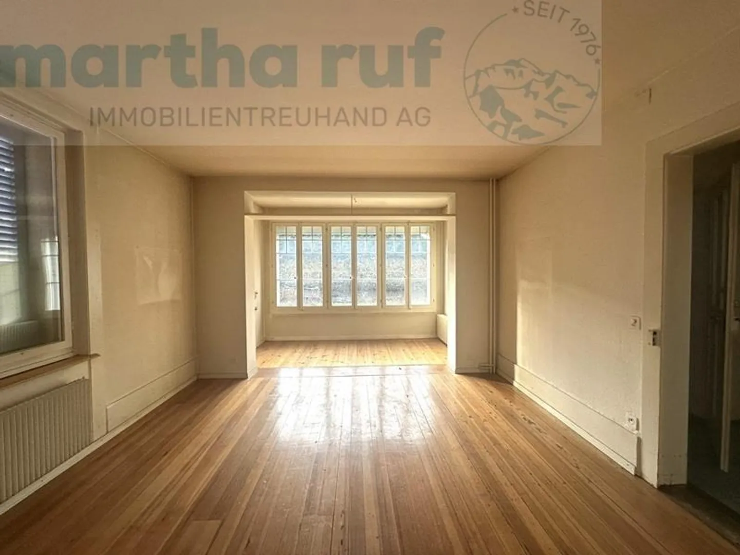 Zentral und sonnig gelegenes 3-Familienhaus mit viel Potenzial - Foto 3 von 23