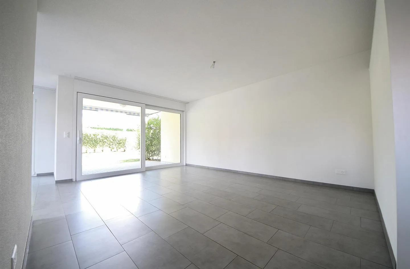 Appartamento tranquillo di 3 ½ locali al piano terra con giardino - Foto 2 di 7