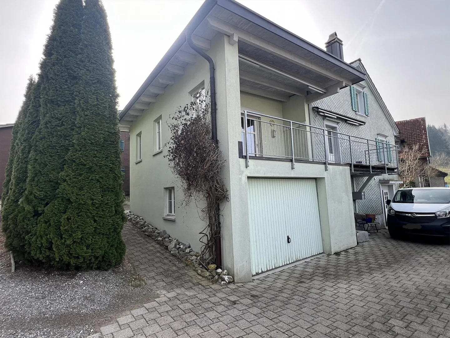 We rent an 8-room single-family house in the center of Ganterschwil - Photo 1 of 13