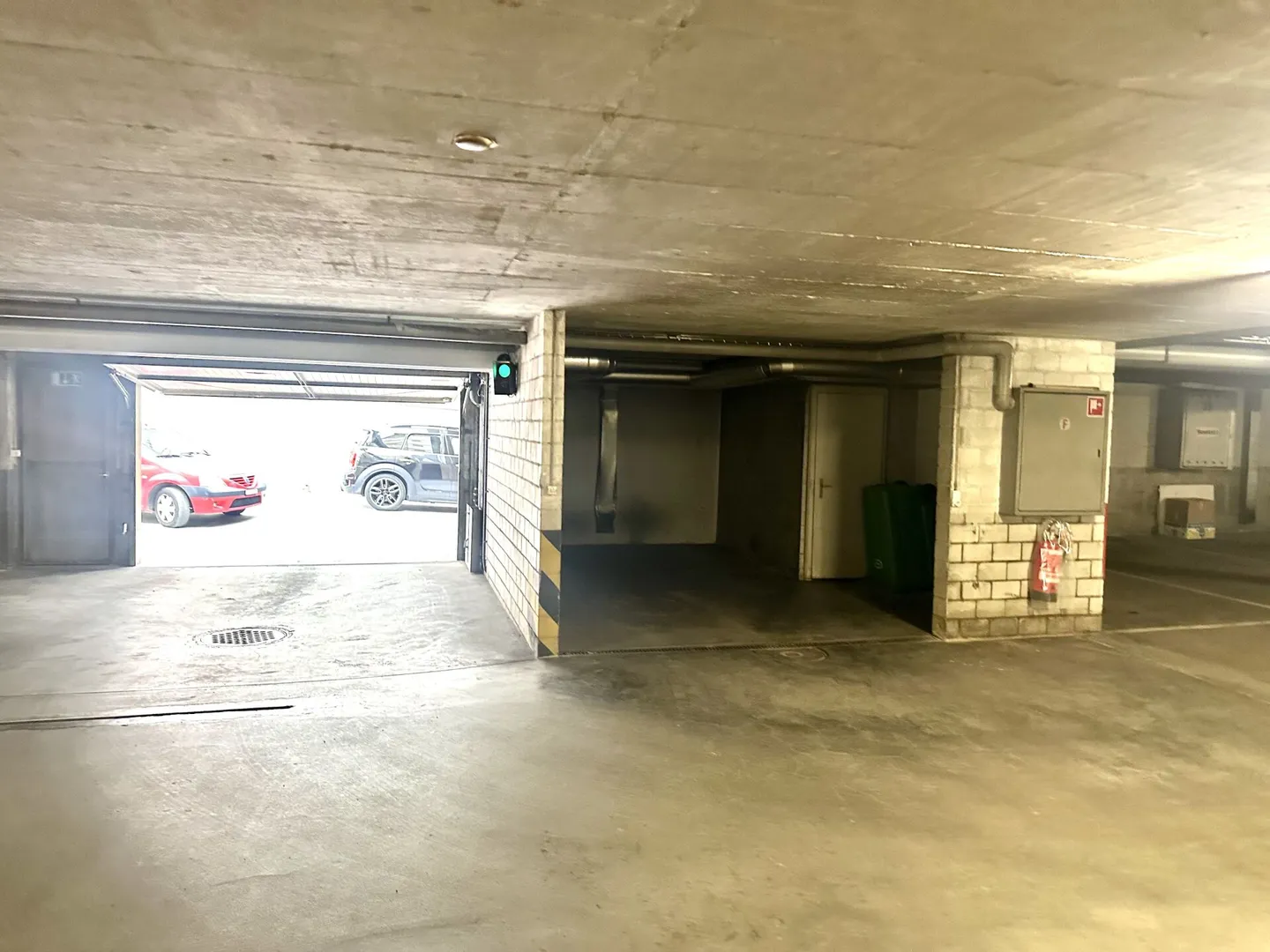 Central. Safe. Dry. - Parking space in the underground garage for rent. - Photo 2 of 4