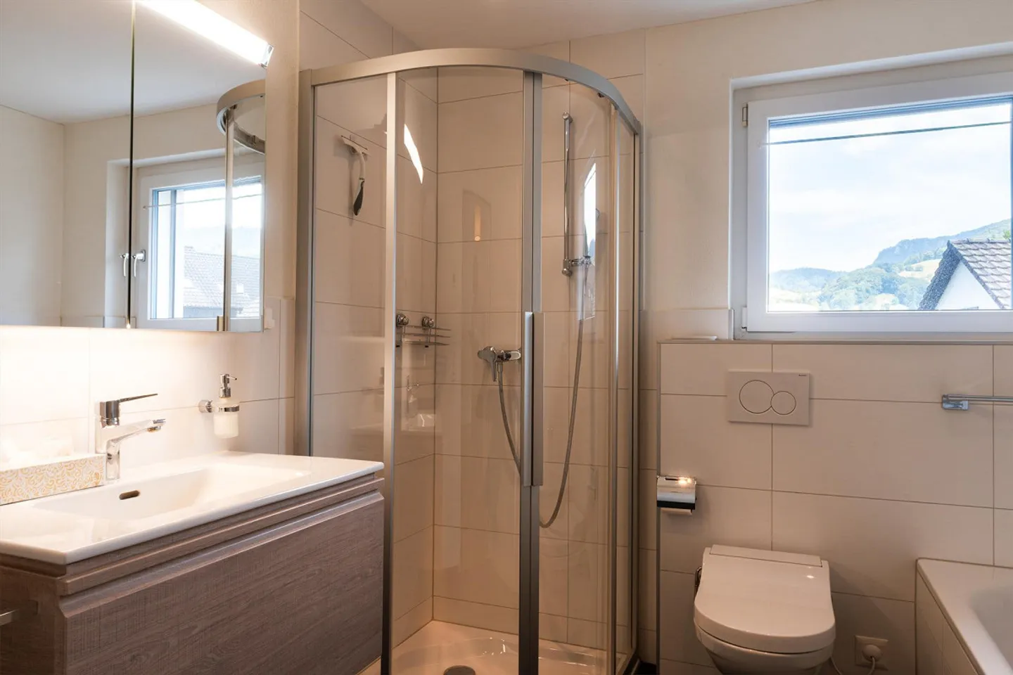 Spacious, modern apartment nestled between hills and village stream - Photo 6 of 7