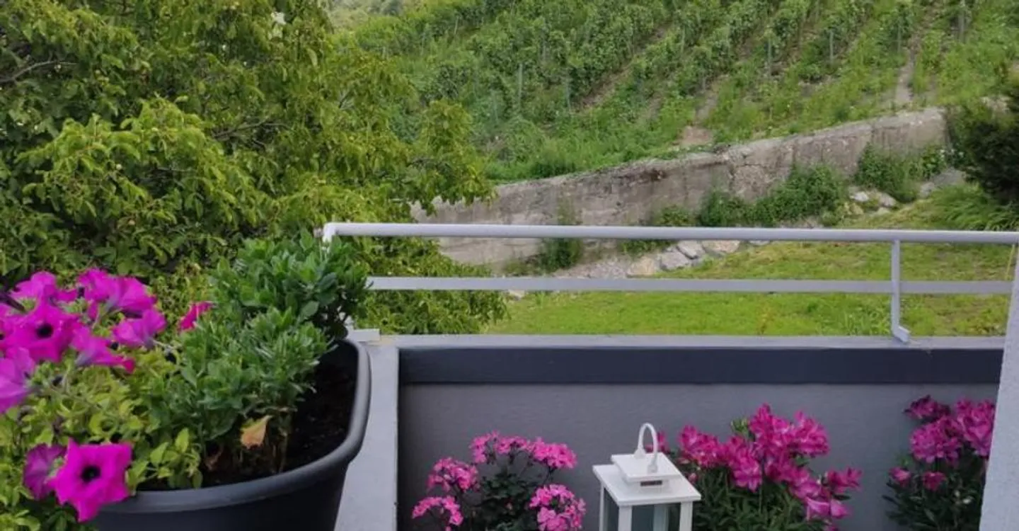 Appartement Duplex avec Vue Époustouflante - Photo 2 sur 8
