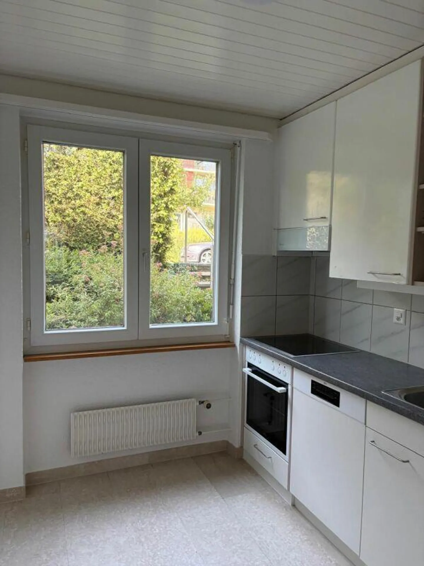 4.5 room apartment on the ground floor right with balcony - Photo 2 of 14