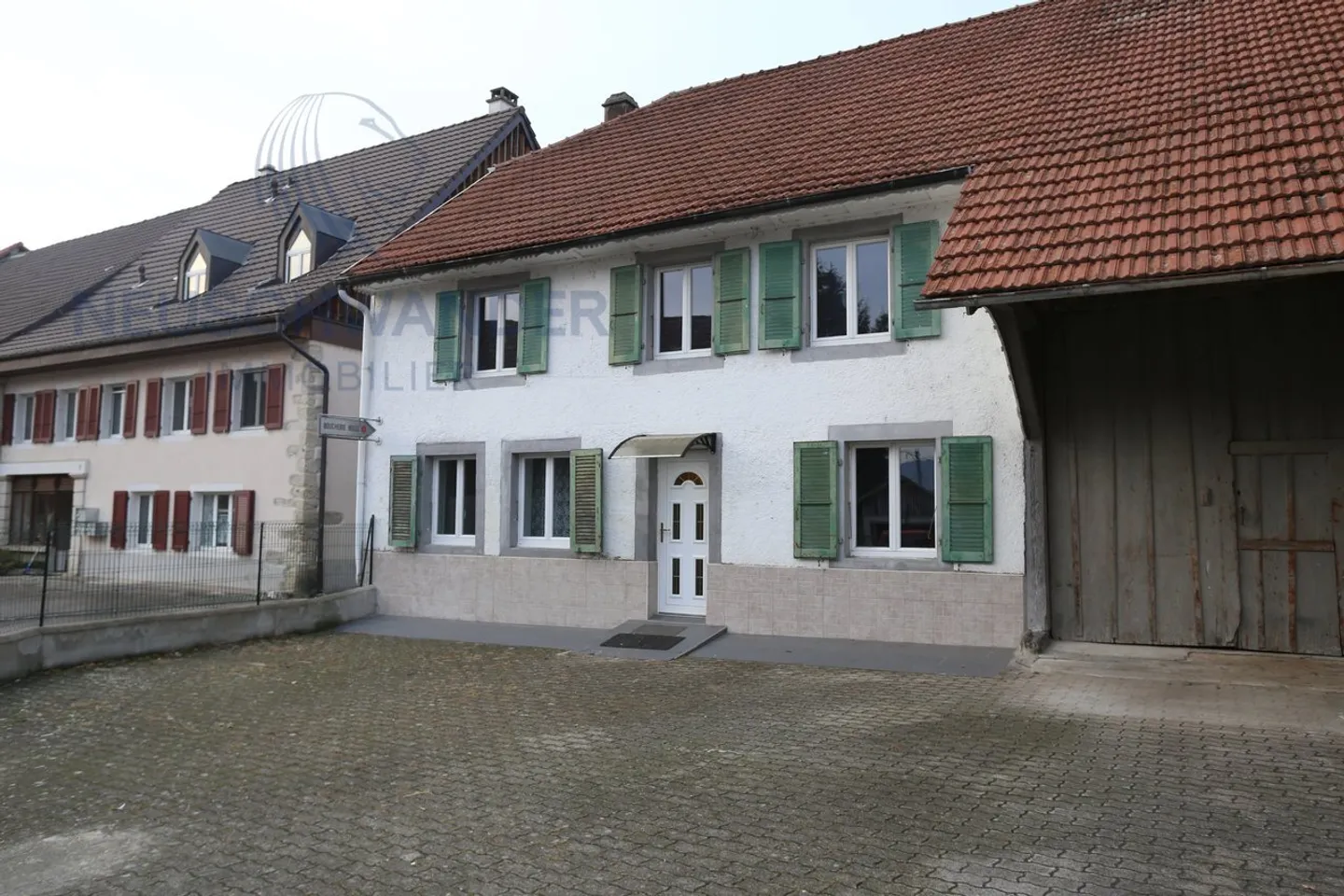 Large renovated building in the middle of the village in a quiet area. - Photo 1 of 15