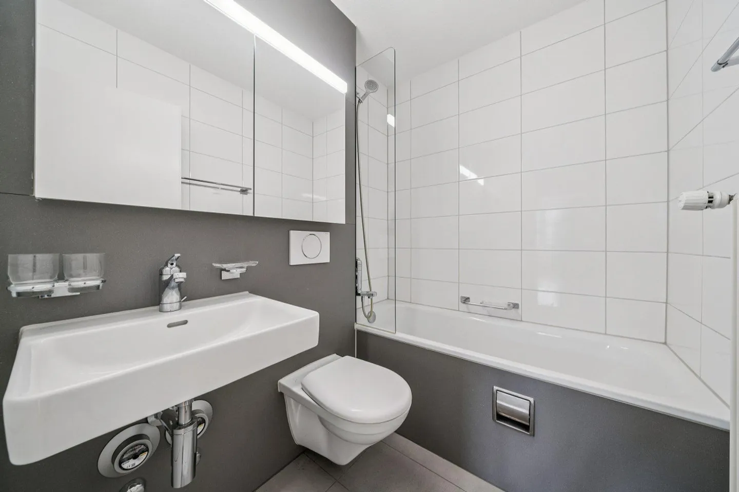 Appartement de 5,5 pièces au rez-de-chaussée avec un agencement spacieux - Photo 11 sur 12