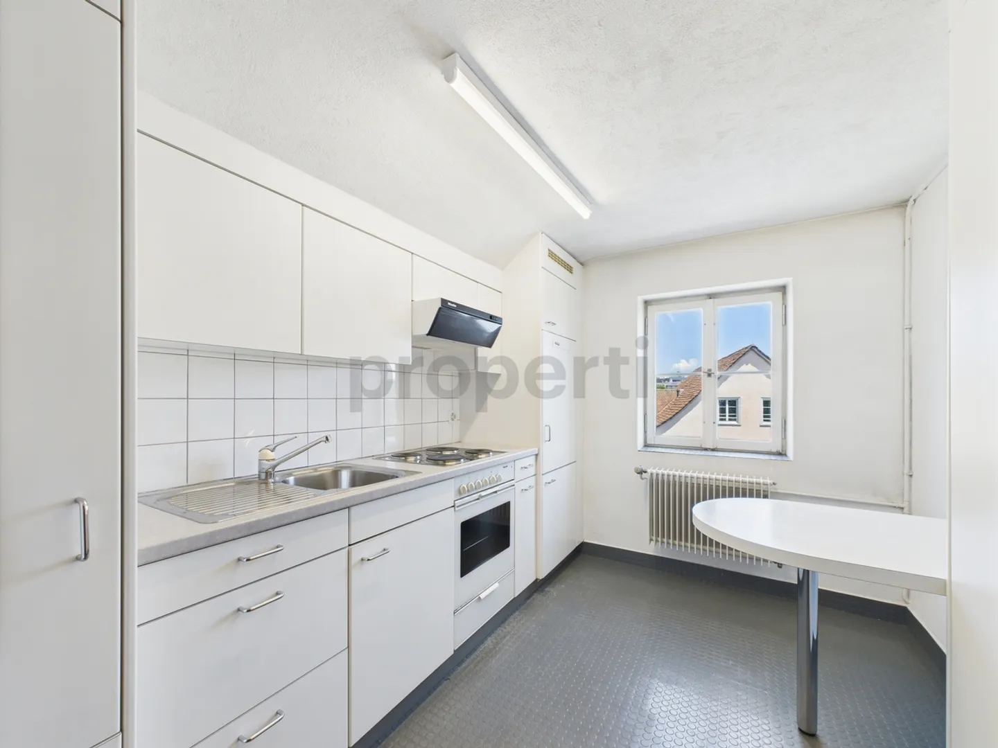 Charmante Dachwohnung an ruhiger und doch zentraler Lage mit schönem Weitblick - Foto 4 von 11