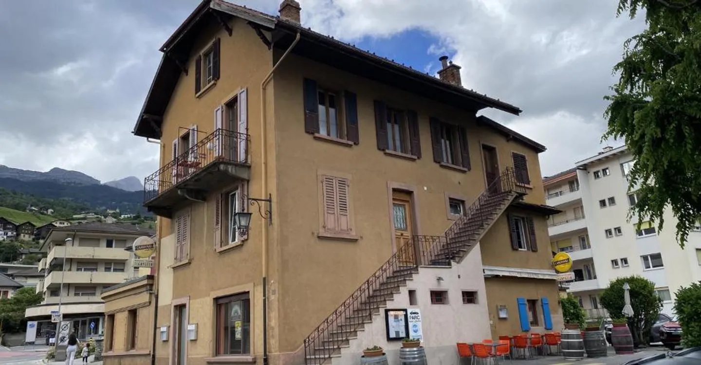 Duplex Apartment with Potential - Photo 2 of 11