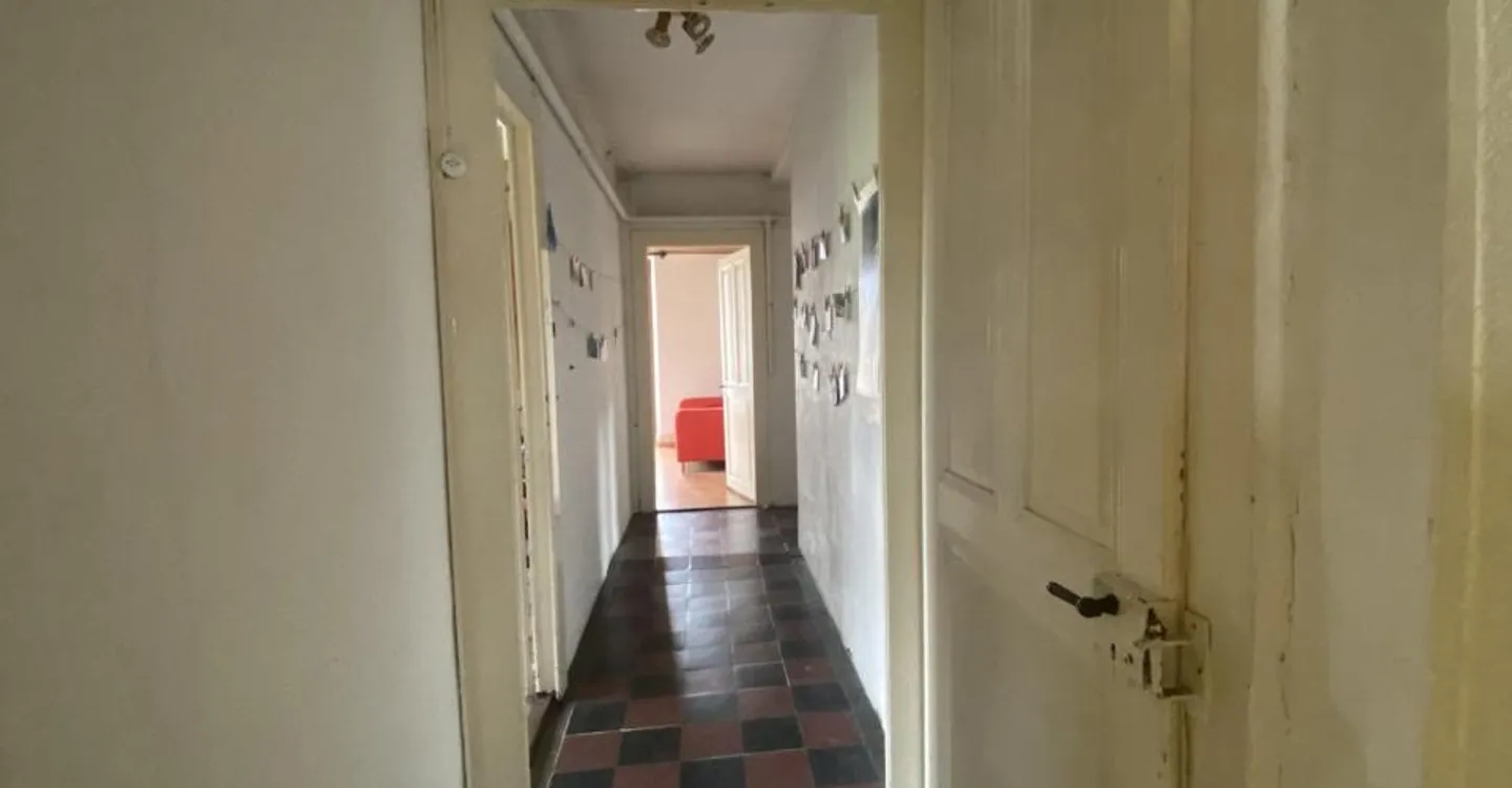 Duplex Apartment with Potential - Photo 7 of 11
