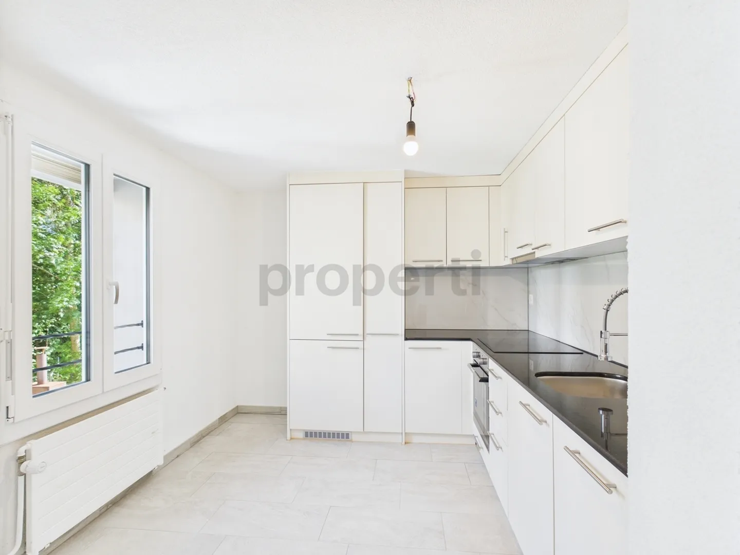 Charming and Sunny Home in the Green with this 3.5-Room Apartment in Ebnat-Kappel - Photo 4 of 12