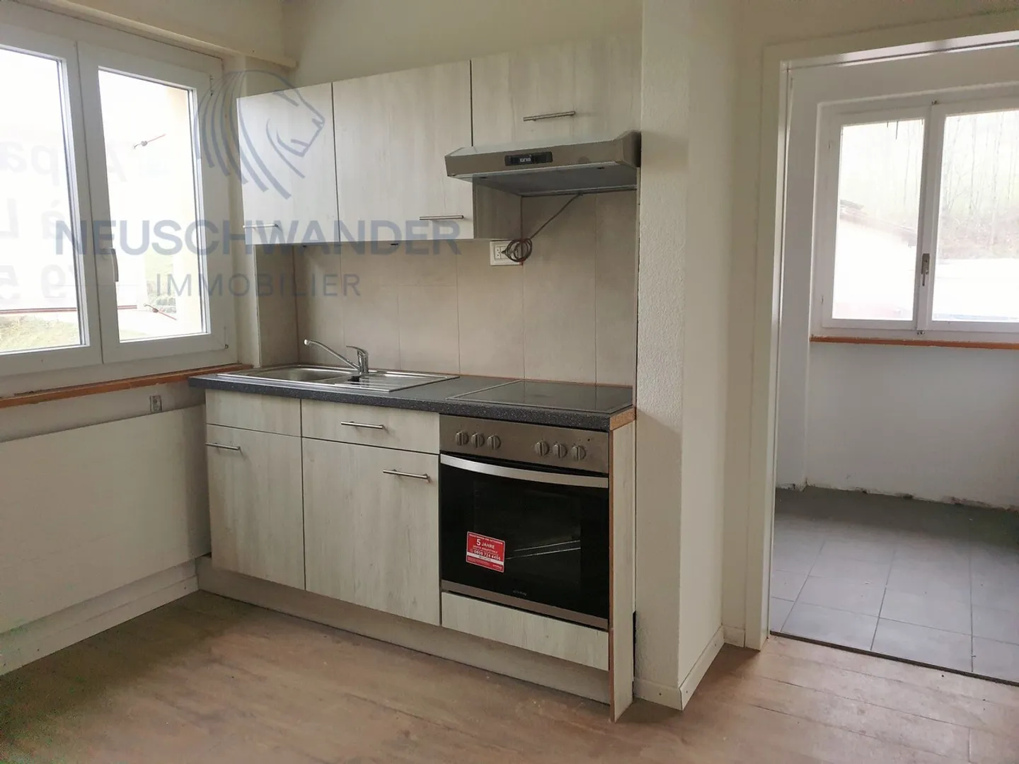 Zwei Wohnungen und ein Geschäftslokal für Ihre Investition - Foto 10 von 10