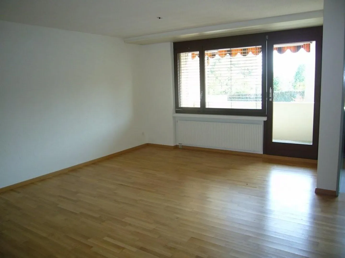 Sonnige Wohnung mit Sitzplatz - Foto 4 von 7
