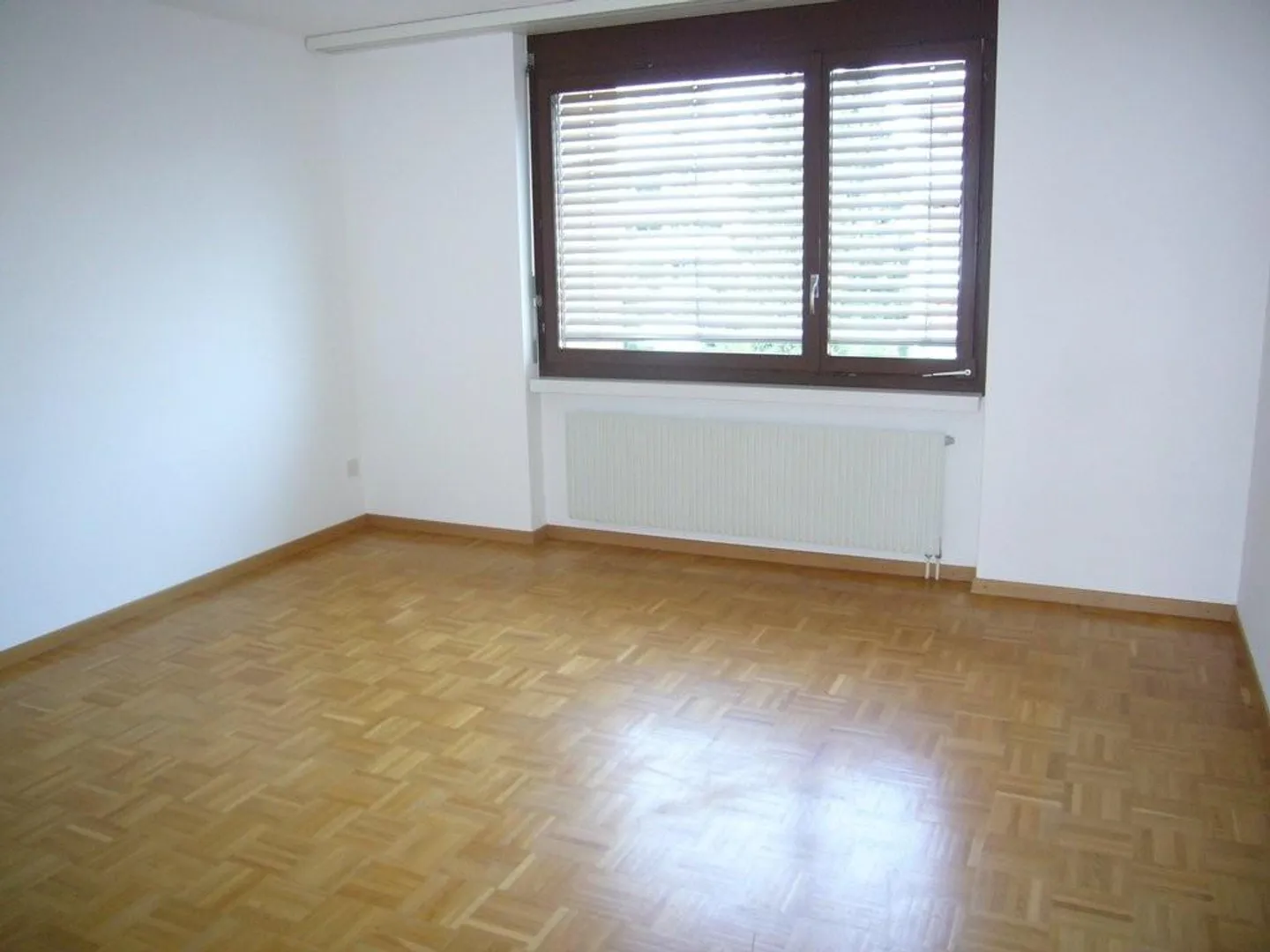 Sonnige Wohnung mit Sitzplatz - Foto 5 von 7