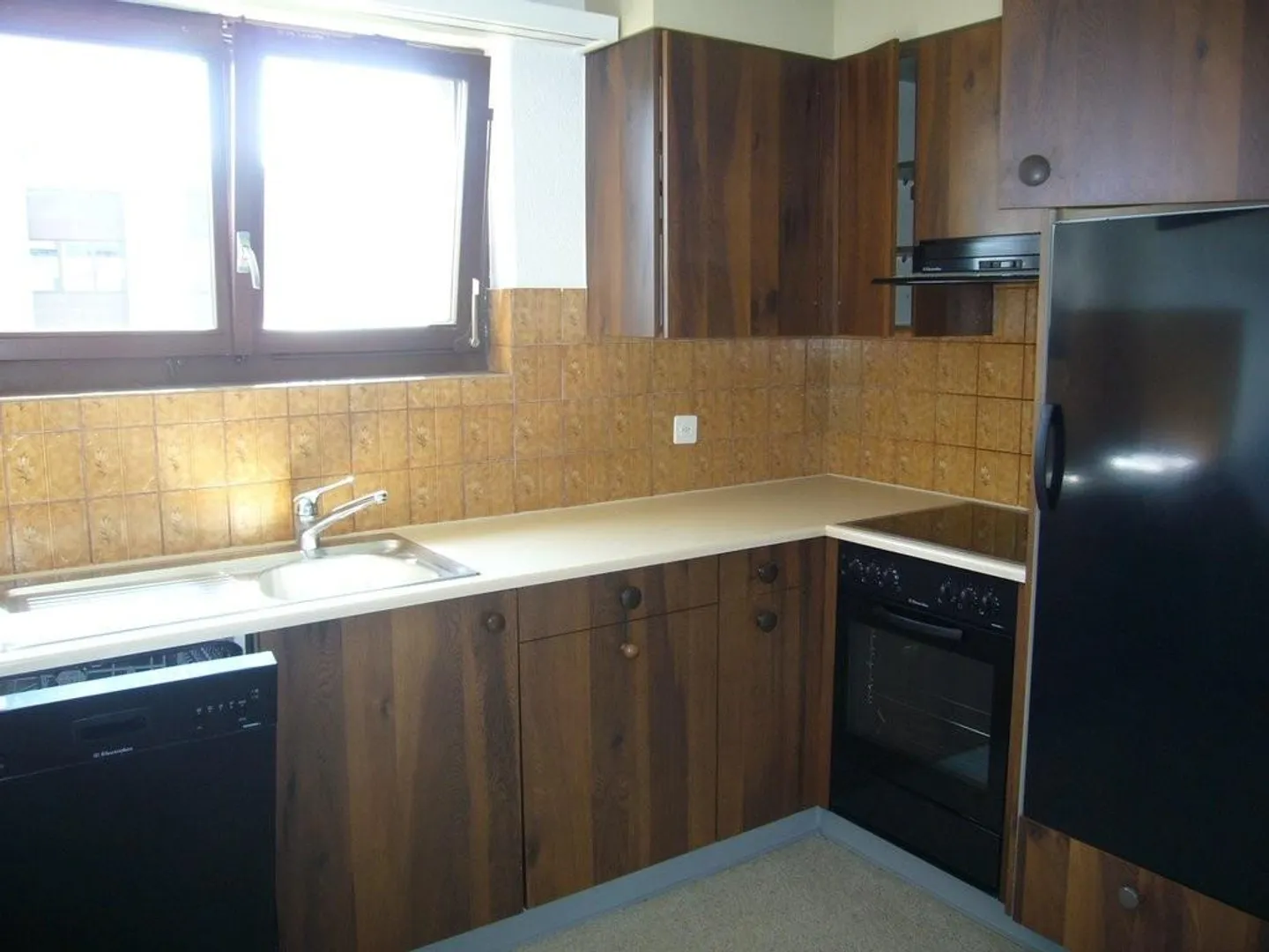 Sonnige Wohnung mit Sitzplatz - Foto 3 von 7