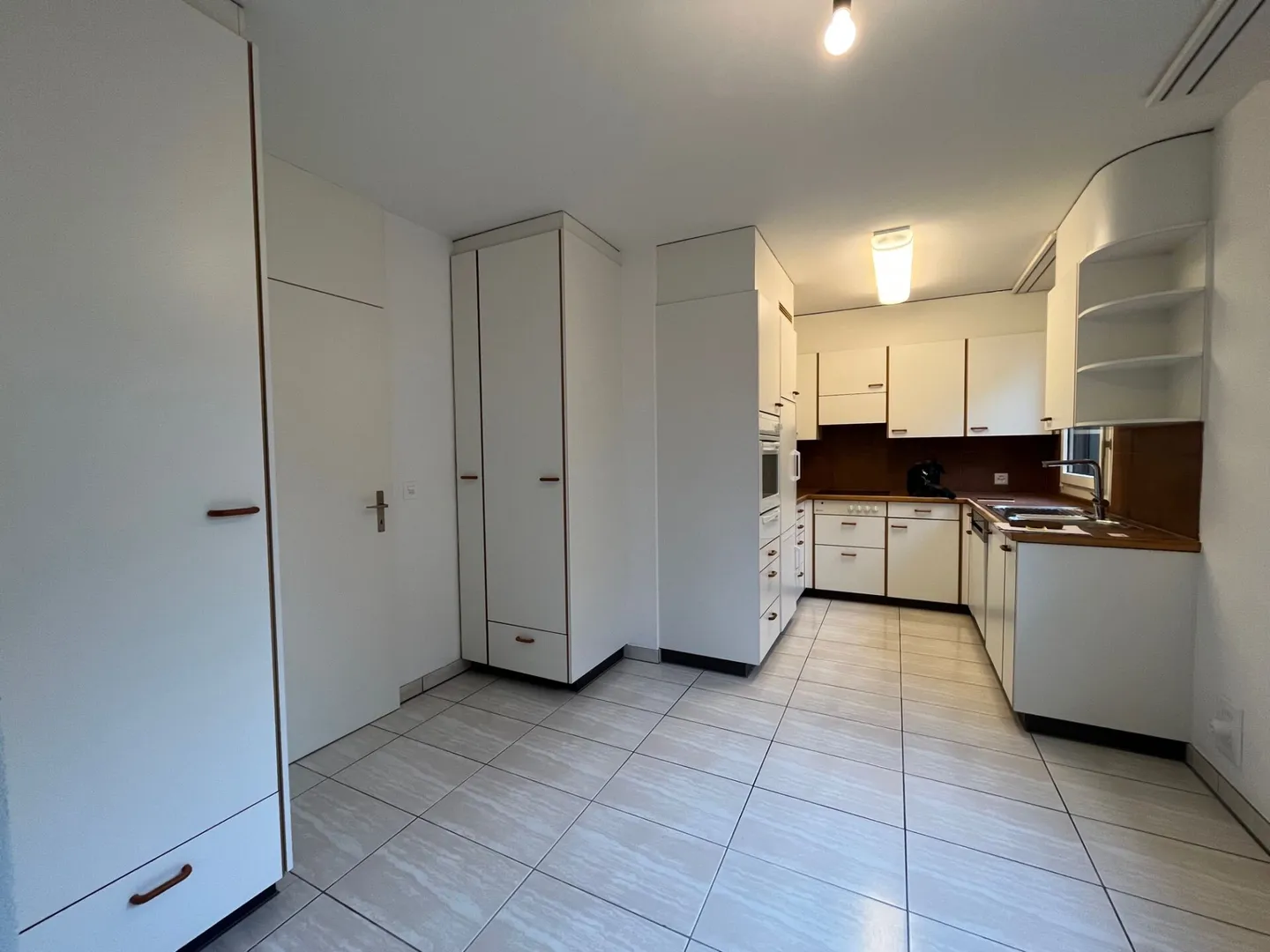 Appartement 3.5 pièces au rez-de-chaussée avec espace jardin - Photo 1 sur 9