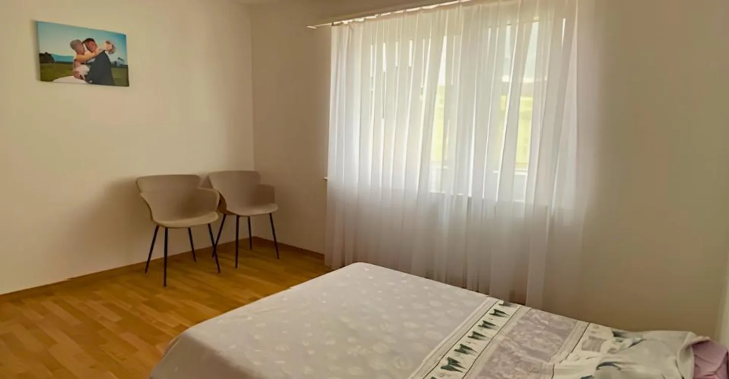 Charmant appartement 3.5 pièces - Photo 2 sur 4