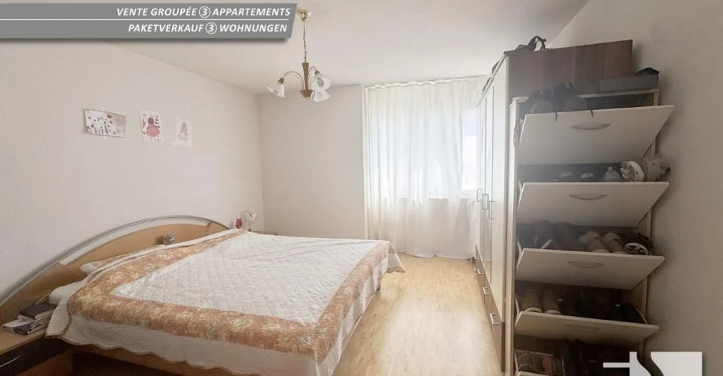 Vendita di 3 appartamenti, 2x 5 stanze e 4 stanze + 3 posti auto interni. - Foto 12 di 12