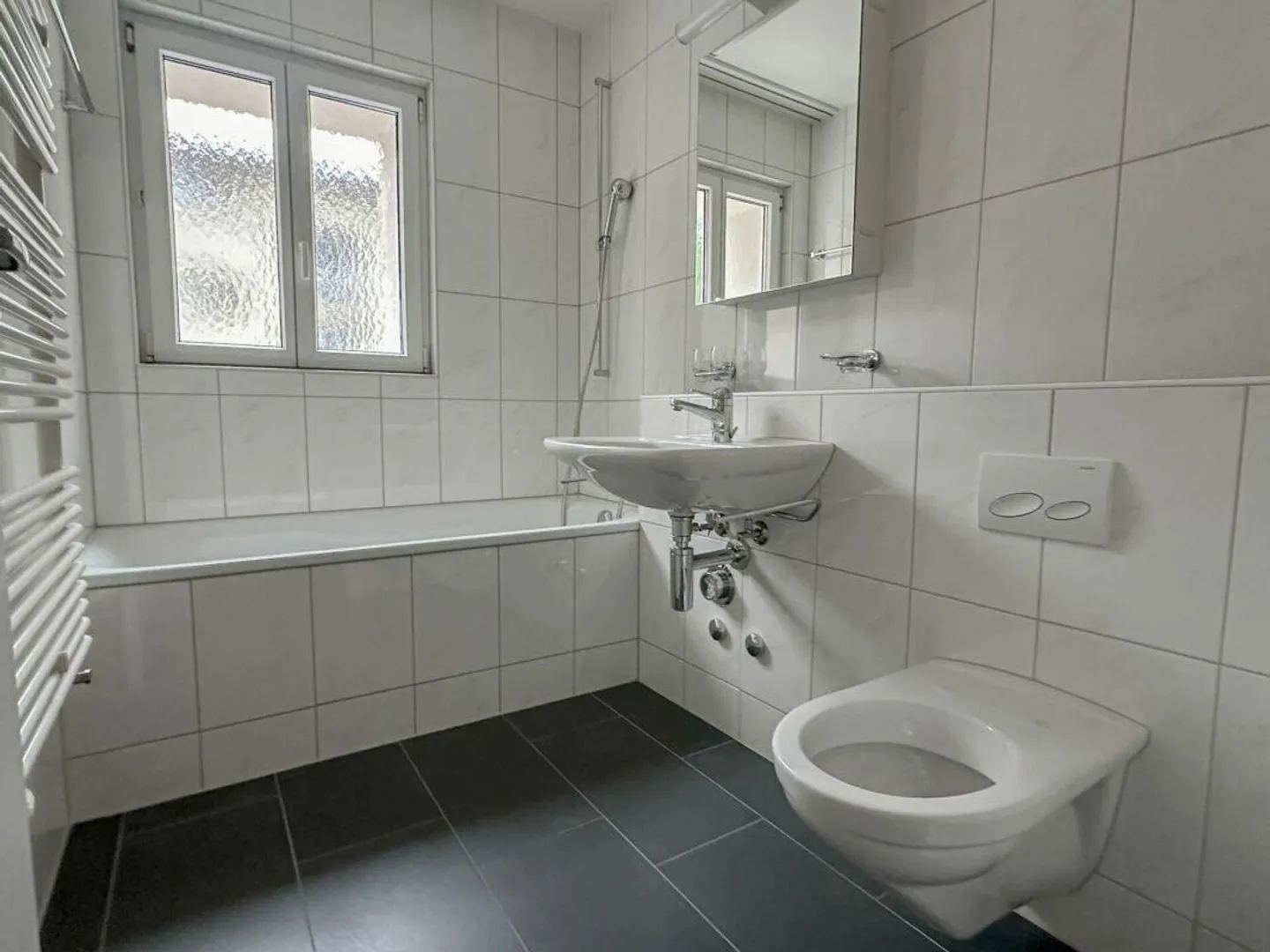 Stylish 2.5-room apartment in the city center - Photo 5 of 8