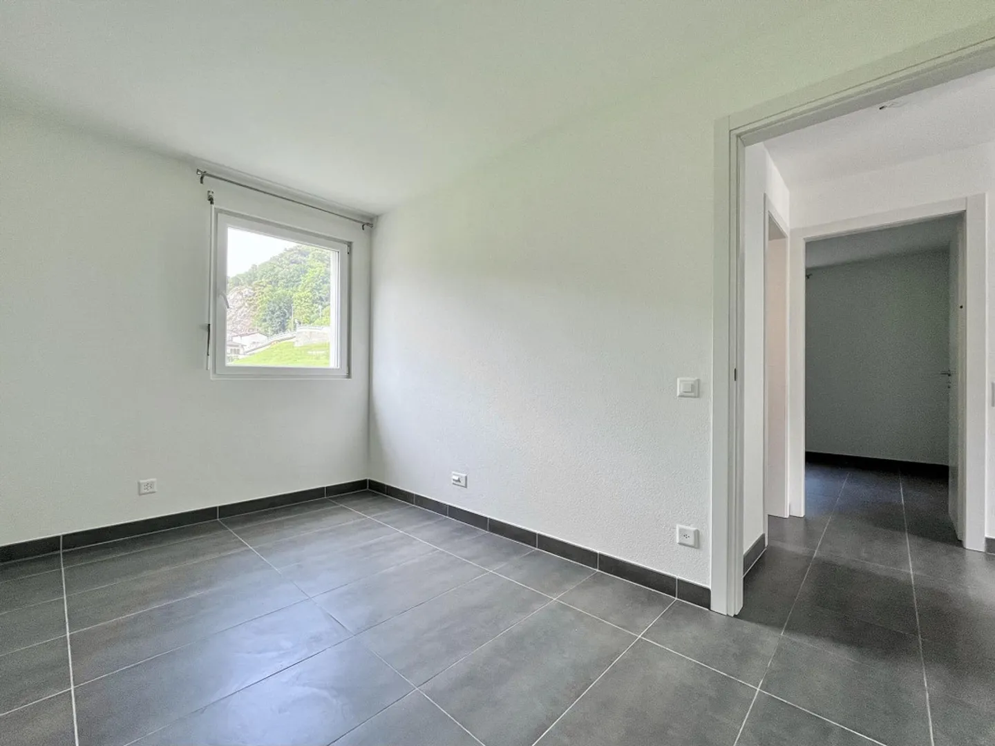 MODERN 3.5 ROOMS APARTMENT WITH TERRACE IN BIRONICO - Photo 8 of 10