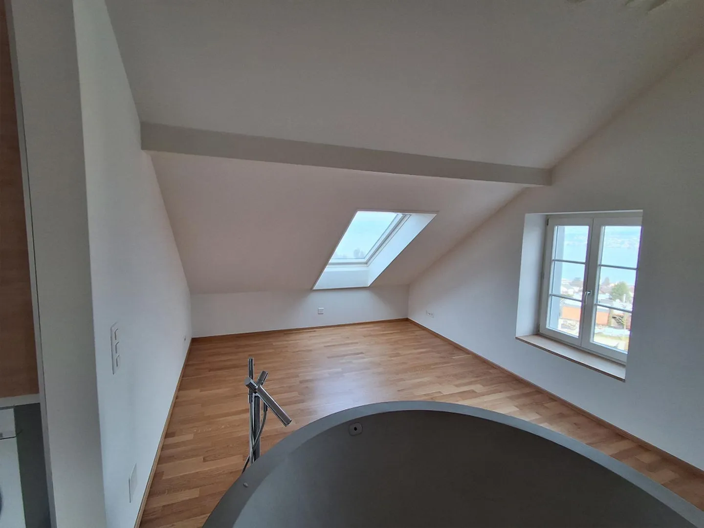 Loft appartement 2.5 pièces avec vue sur le lac, terrasse, coin jardin - Photo 16 sur 20