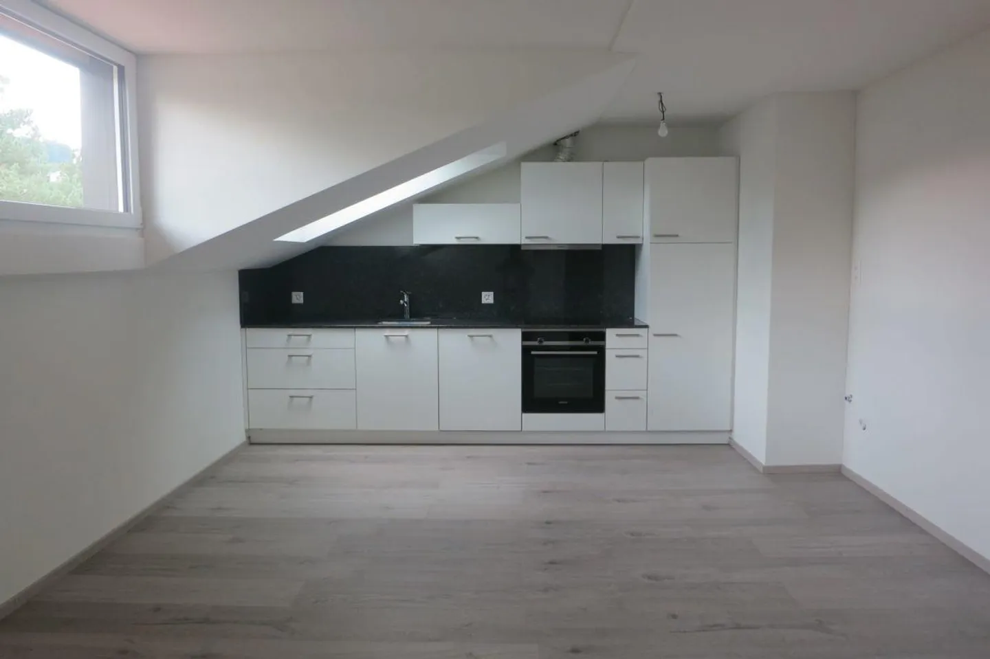 Cozy 2-room attic apartment with modern expansion - in the idyllic Balterswil - Photo 1 of 4