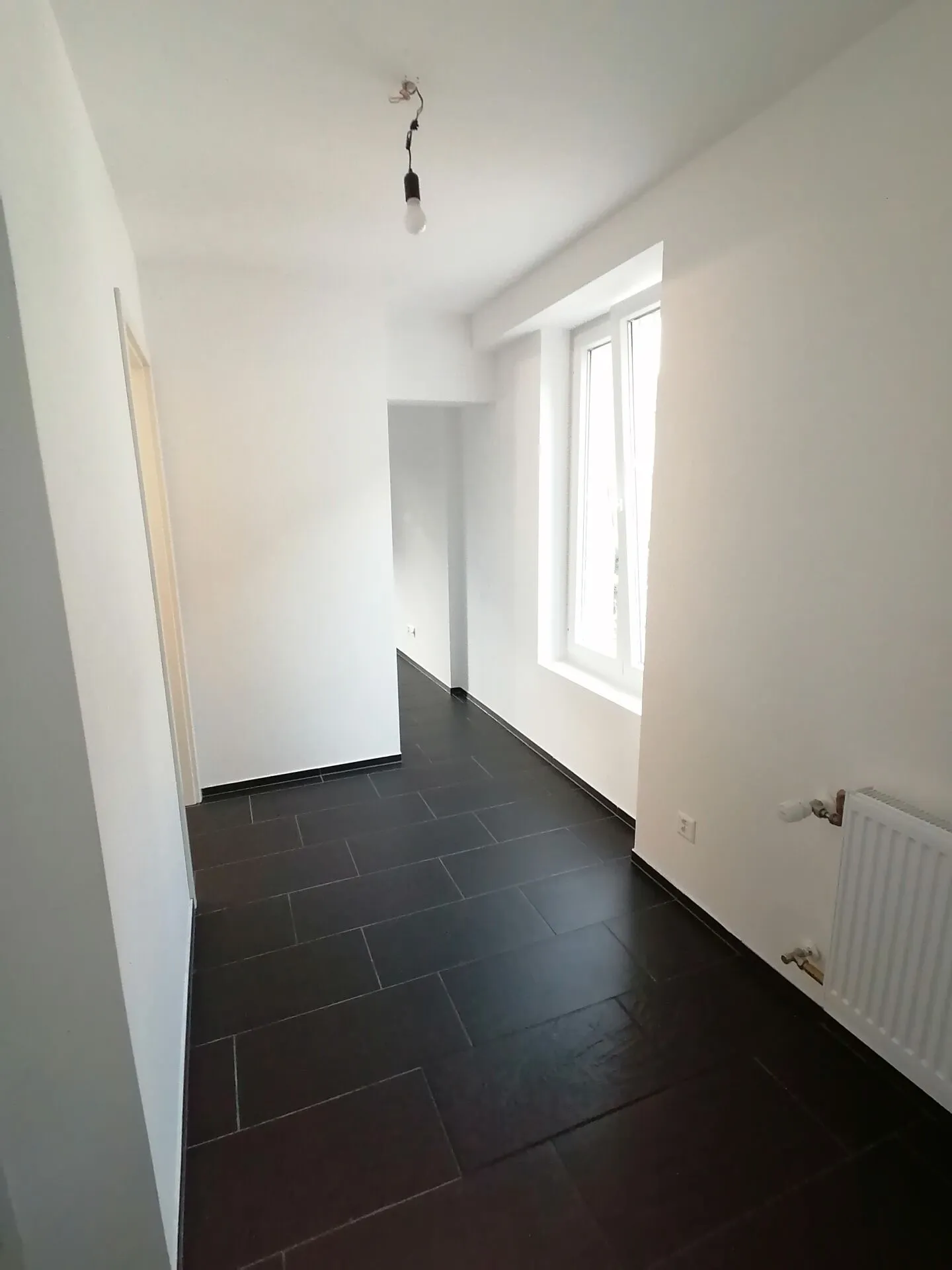 Appartement à louer - Photo 3 sur 6