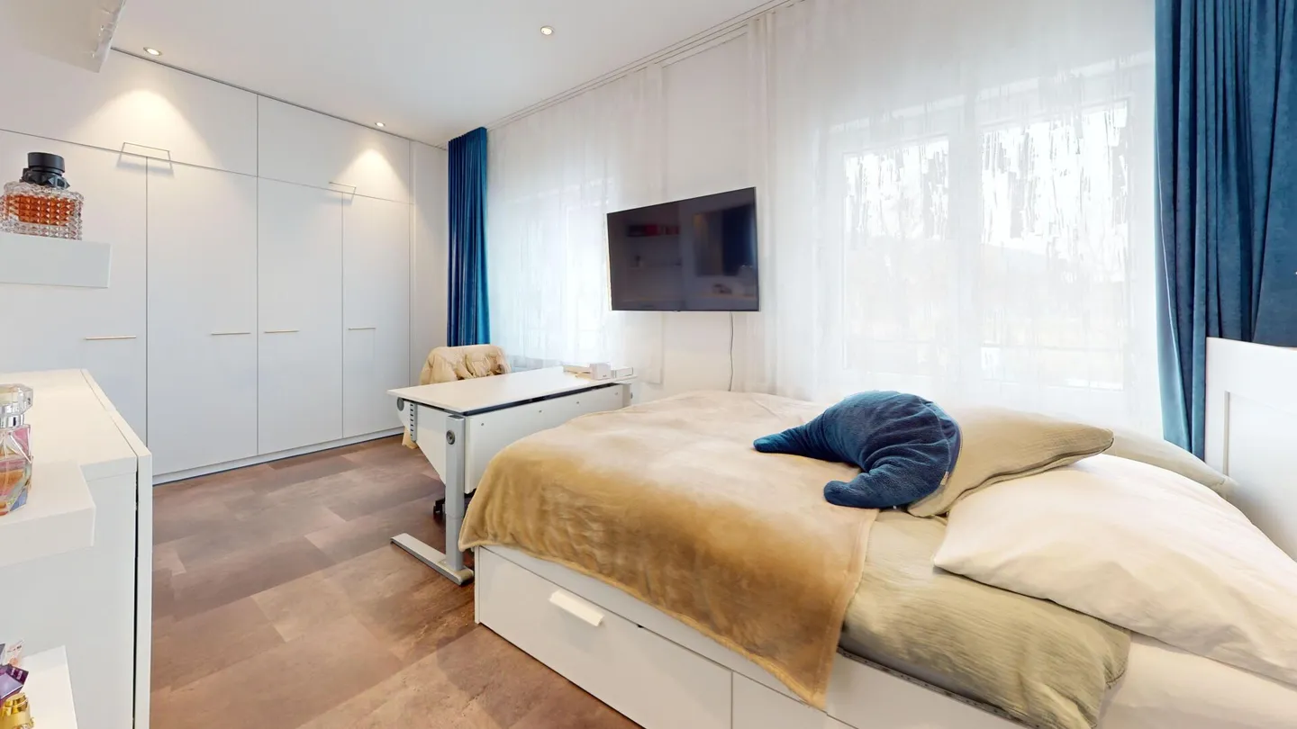 Appartamento maisonette quasi nuovo di 5,5 locali con camino e doppio garage - Foto 11 di 15