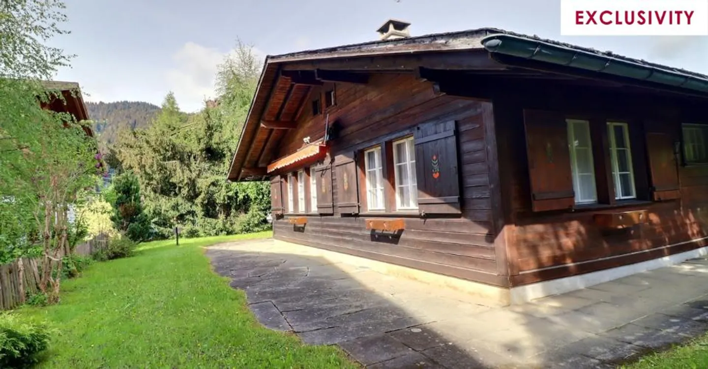 Seltenheit! Baugrundstück mit Chalet zur Renovierung - Foto 1 von 6