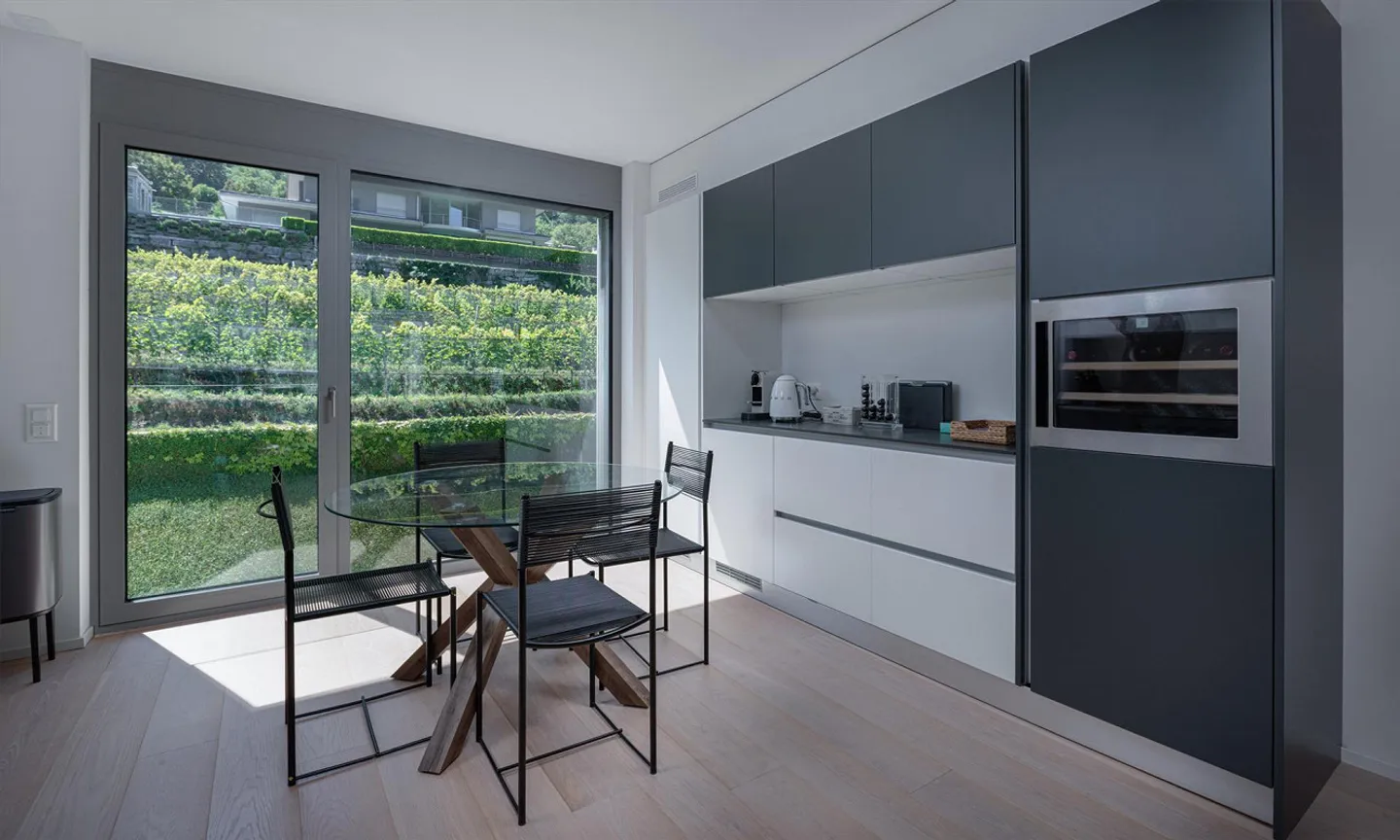 Moderne 3.5-Zimmer-Wohnung mit großer Terrasse und Seeblick in Riva San Vitale - Foto 4 von 9