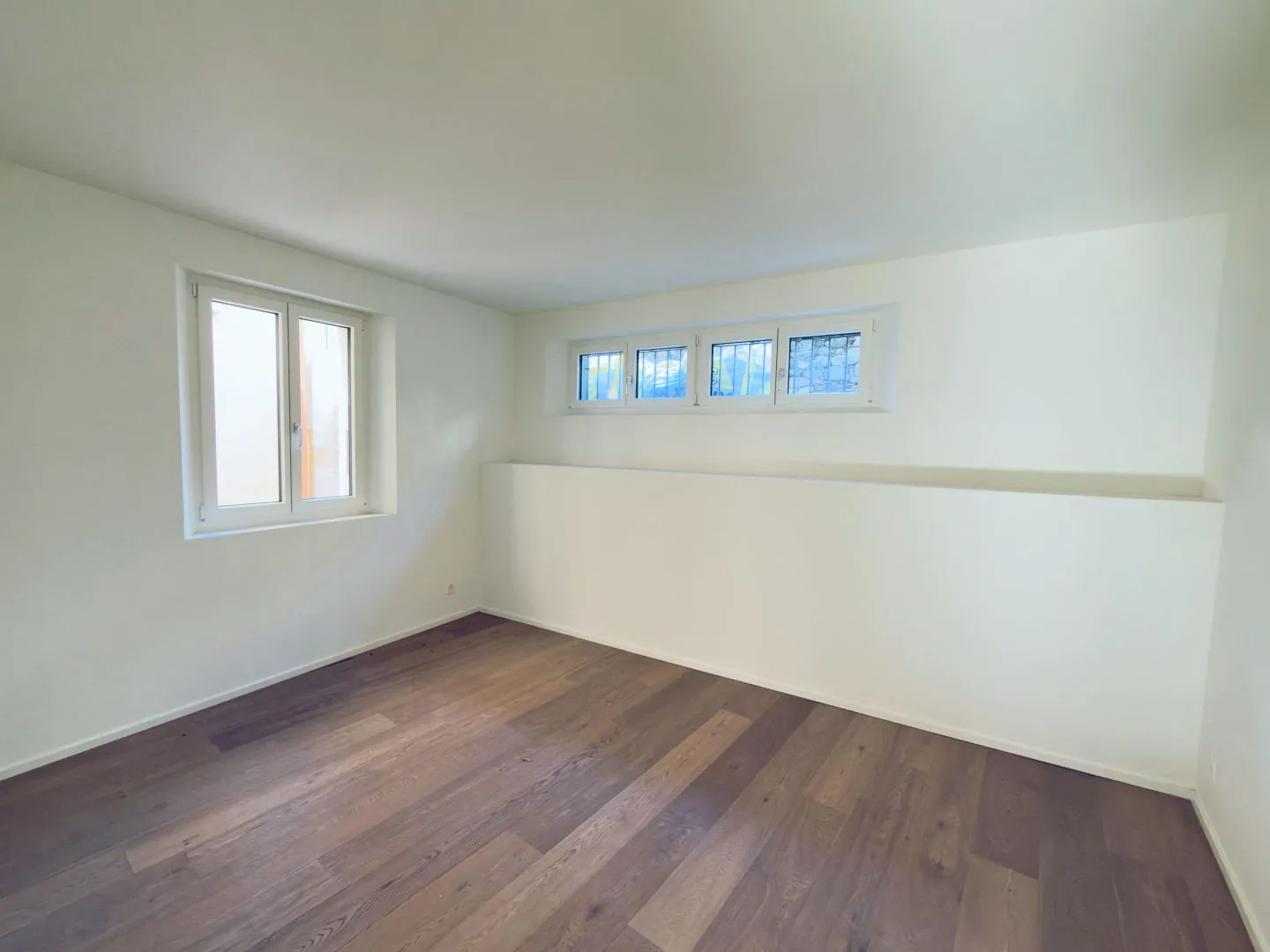 Casa Gatti : Appartement rénové de 3,5 pièces au rez-de-chaussée | Résidence Gatti : Appartement rénové de 3,5 pièces au rez-de-chaussée - Photo 5 sur 10