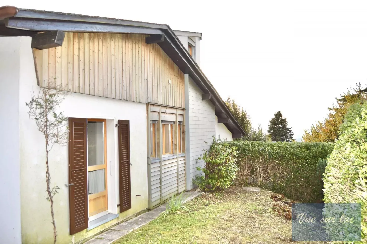 Casa familiare degli anni '60 con vista lago - Foto 9 di 26