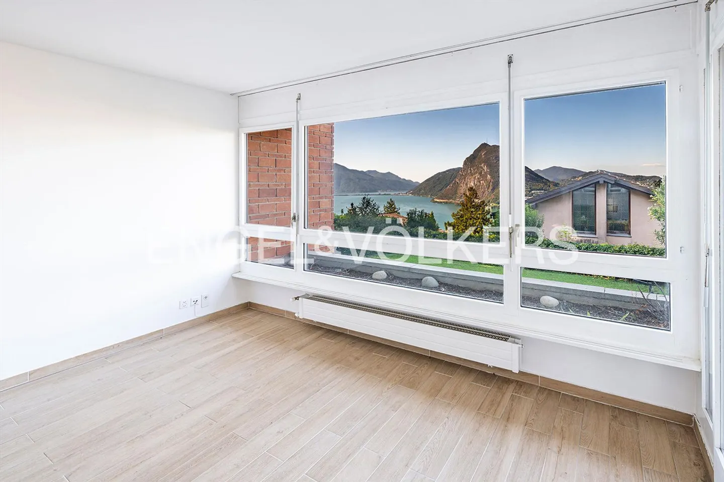 Appartement Charmant avec Vue sur le Lac - Photo 2 sur 13