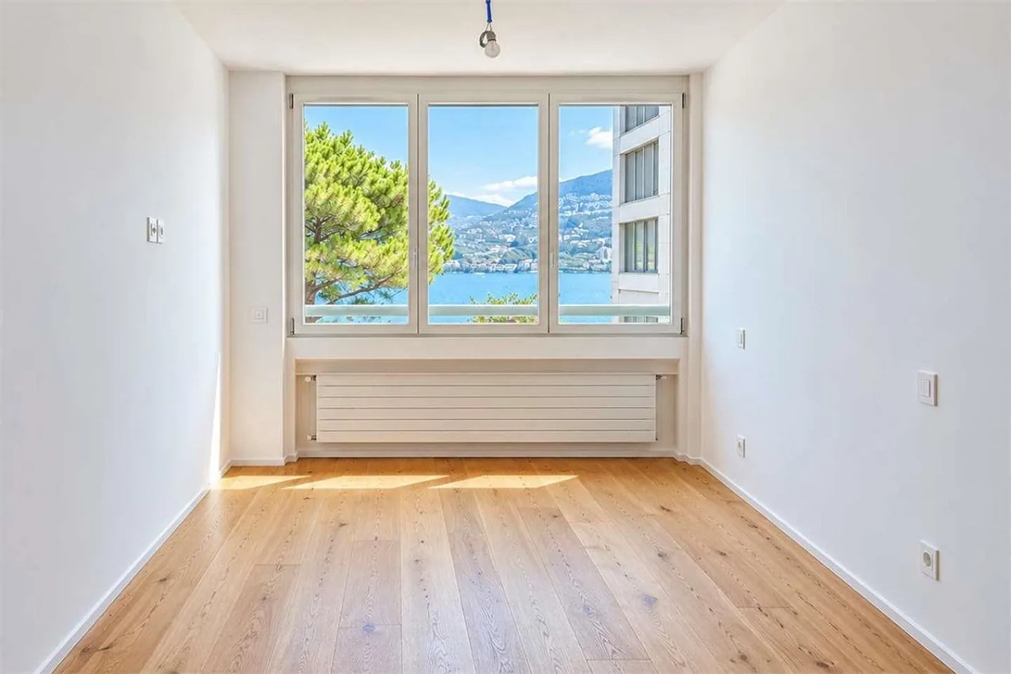 Appartement lumineux de 2,5 pièces avec vue sur le lac à Paradiso - Photo 6 sur 10
