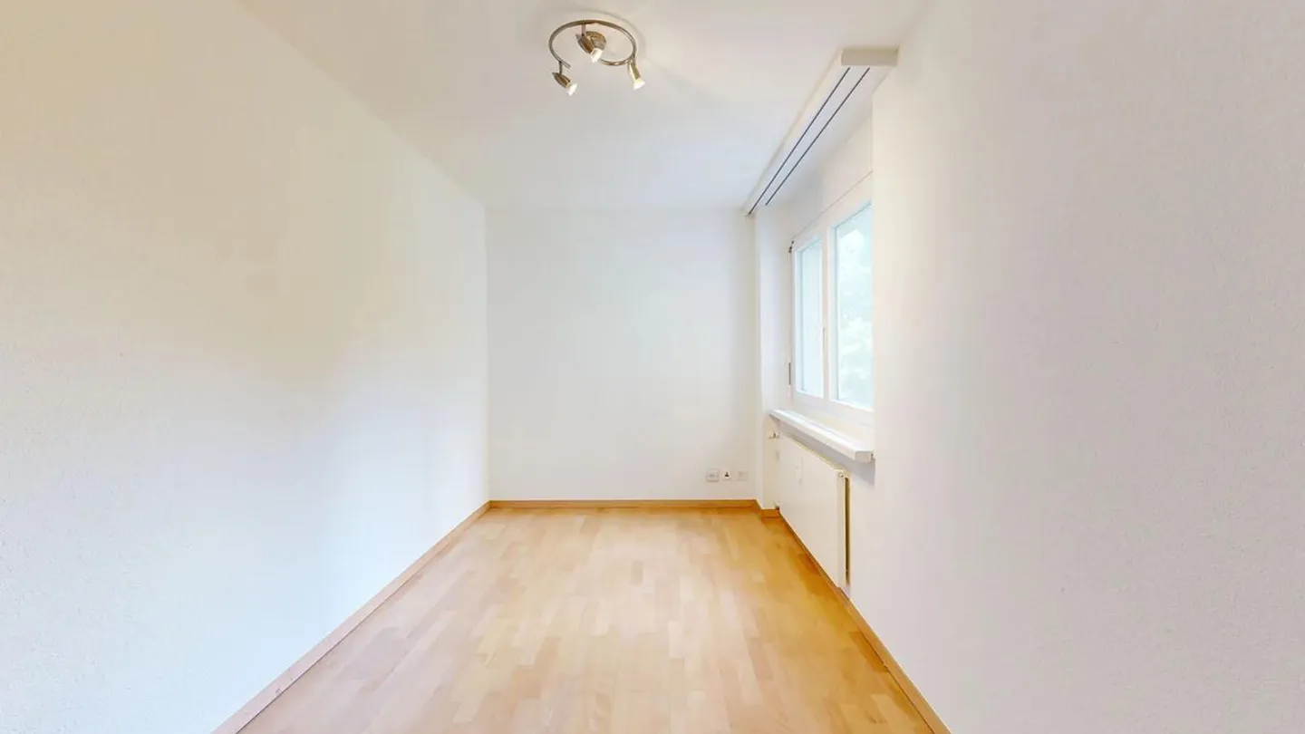 Appartement lumineux de 3,5 pièces avec place de parking - Photo 7 sur 14