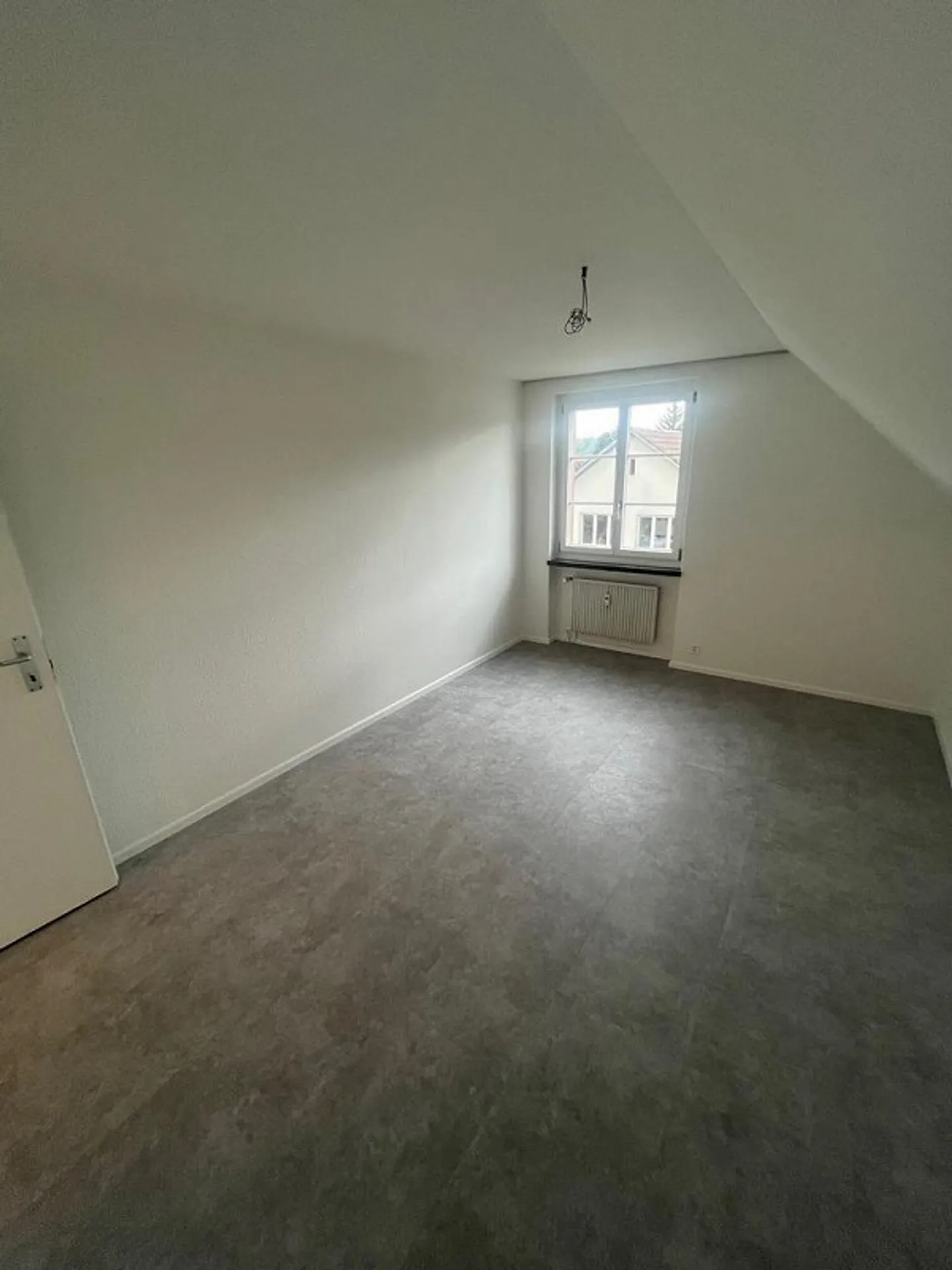 Appartement en duplex spacieux au centre du village - Photo 5 sur 11