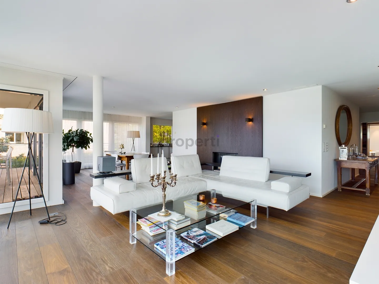 Appartement en terrasse exclusif de 4,5 pièces avec vue imprenable sur le lac à Zollikon - Photo 2 sur 9