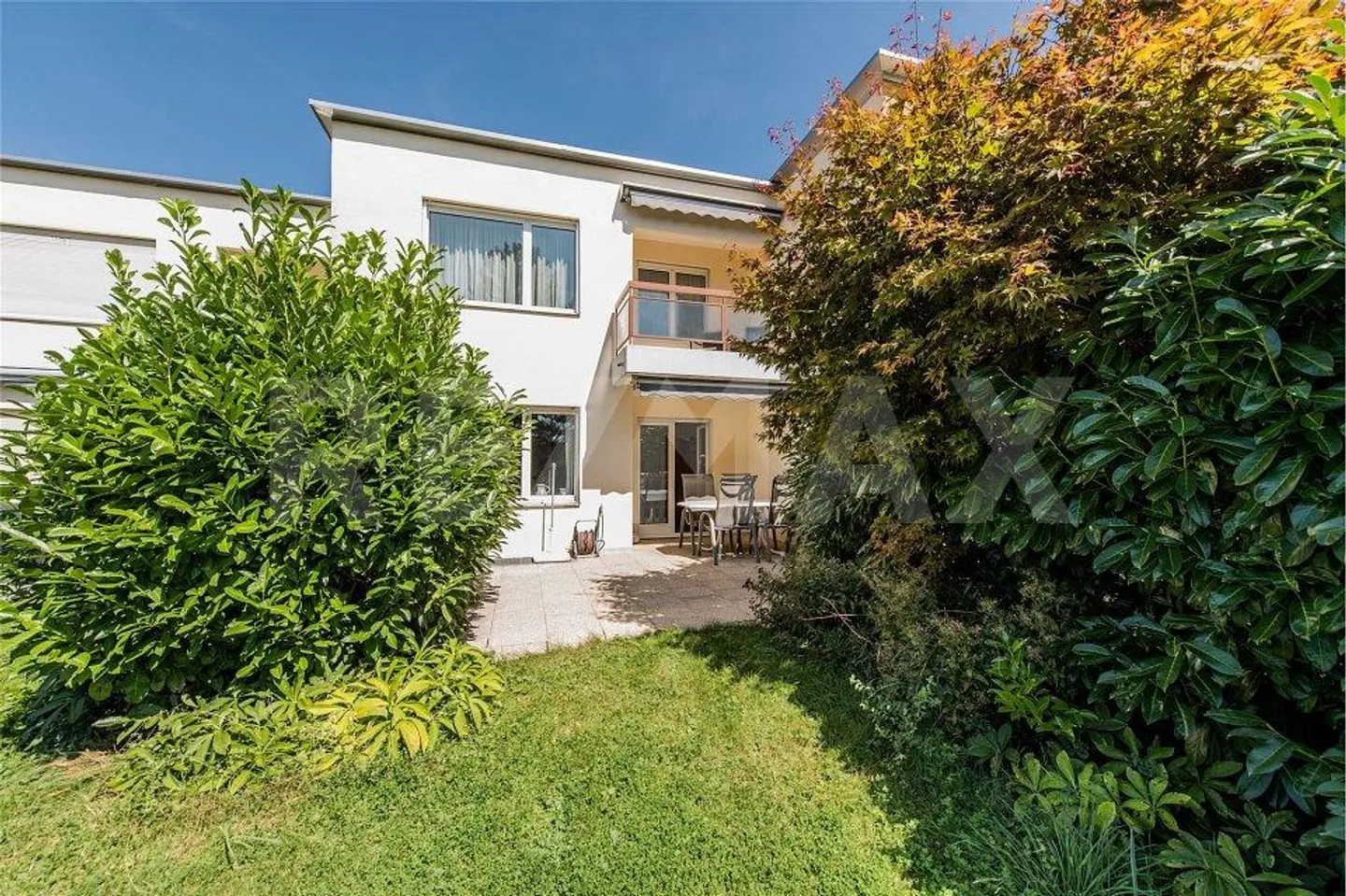Casa a schiera soleggiata di 5 ½ locali in una posizione molto tranquilla - Foto 1 di 12