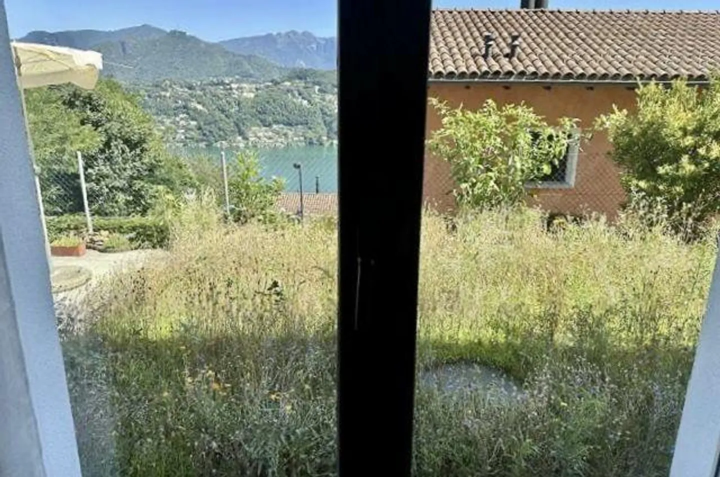 Appartement 3 1/2 au rez-de-chaussée avec terrasse et prairie fleurie avec vue sur le lac - Photo 18 sur 23
