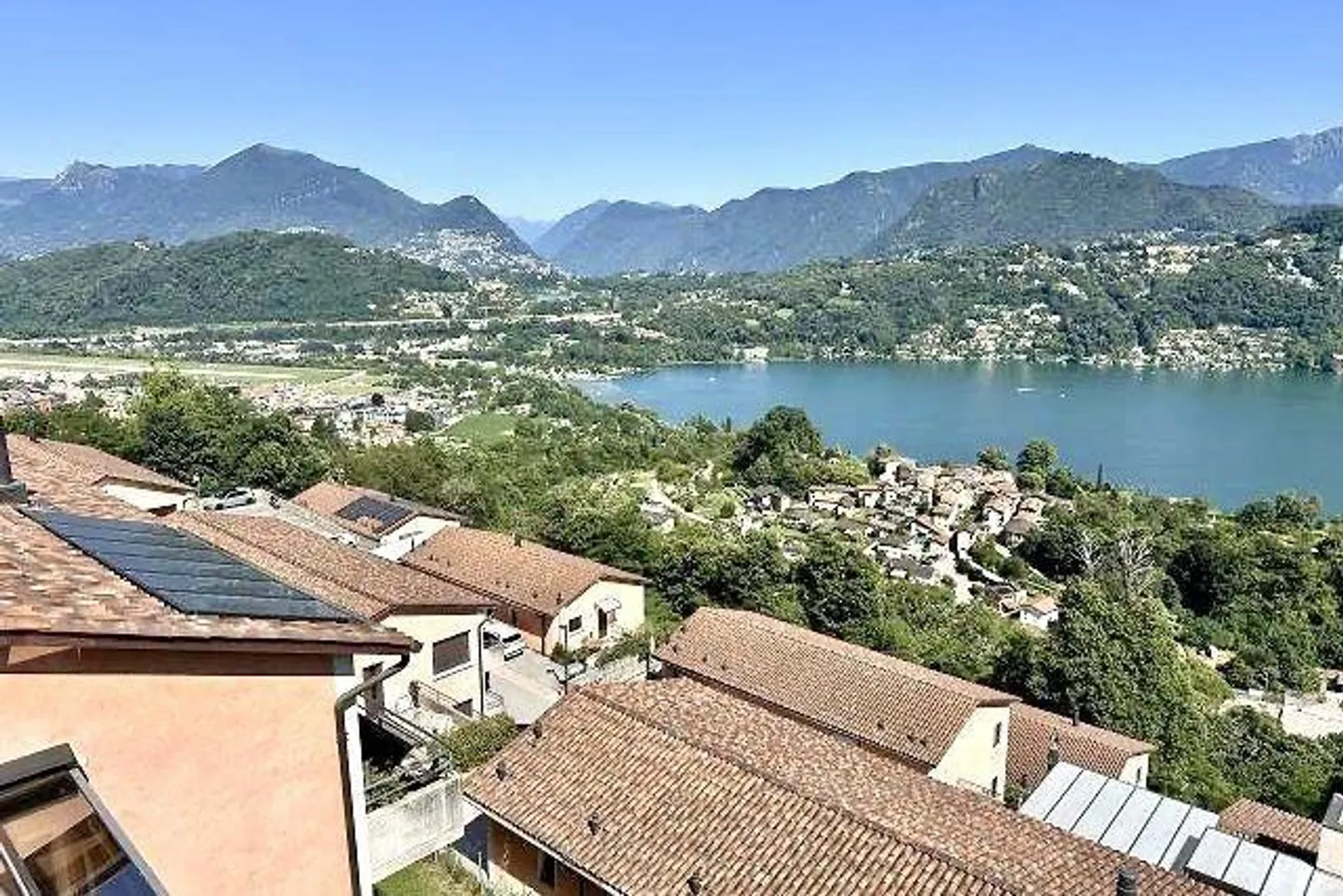 Appartement 3 1/2 au rez-de-chaussée avec terrasse et prairie fleurie avec vue sur le lac - Photo 19 sur 23