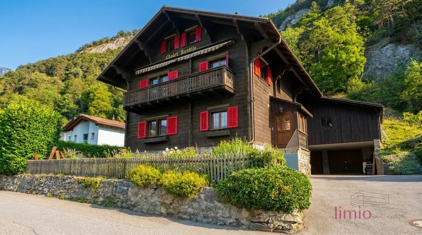 A RARE OPPORTUNITY: Completely renovated chalet with a separate apartment just 5 minutes from Chur - Photo 1 of 13