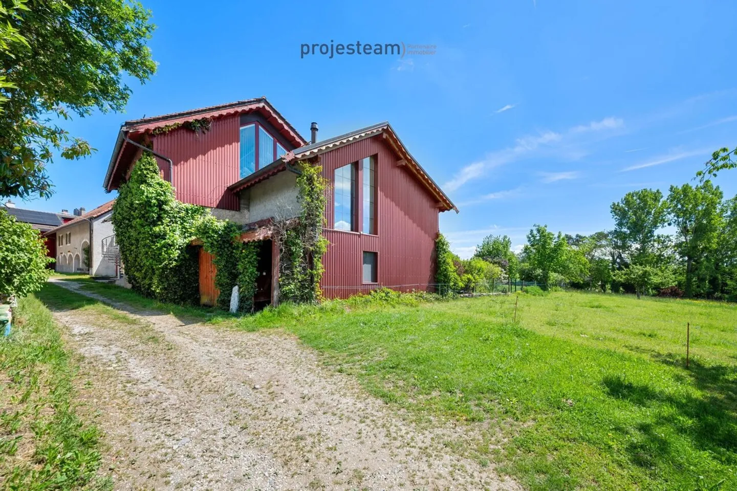 Spacious Rooms and Abundant Light in the Heart of a Renovated Farmhouse - Photo 2 of 13