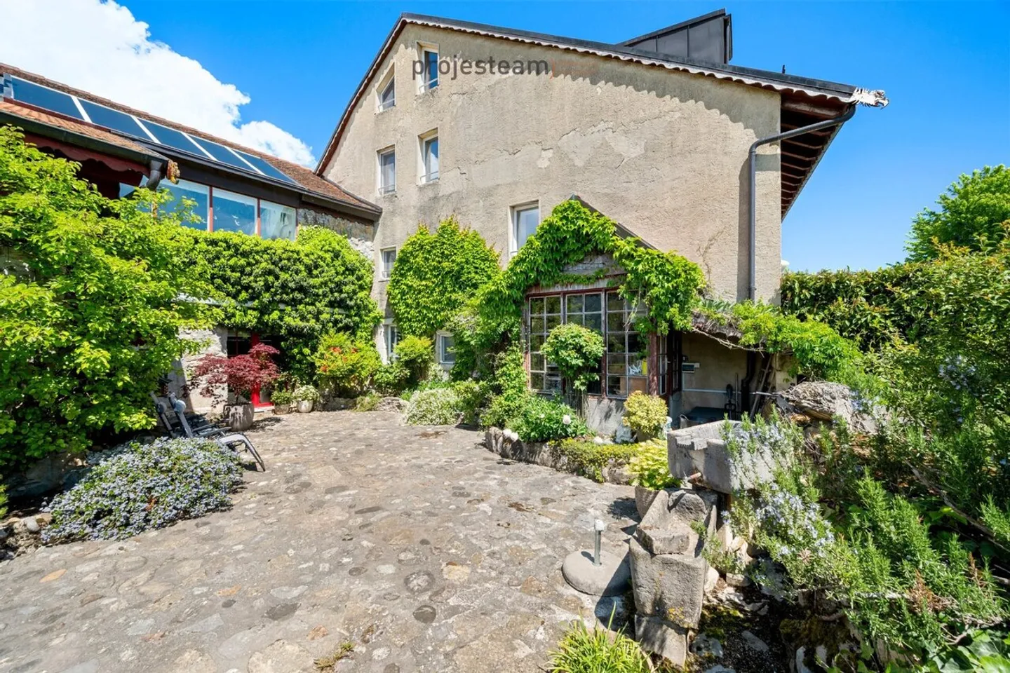 Spacious Rooms and Abundant Light in the Heart of a Renovated Farmhouse - Photo 4 of 13