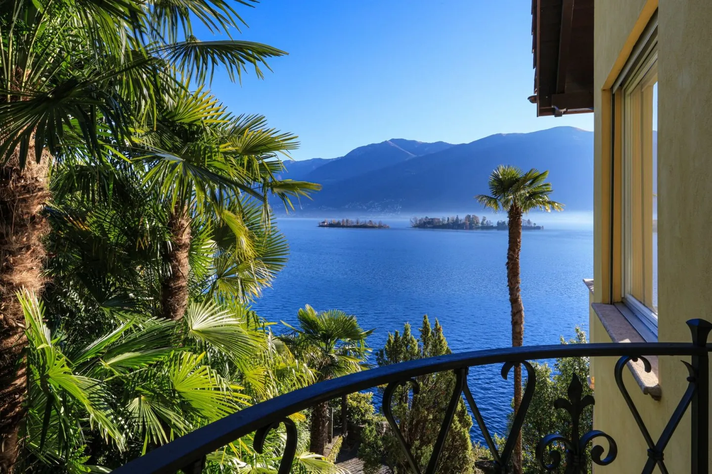 Attico esclusivo con vista lago non ostacolata e accesso privato al lago - Foto 5 di 9